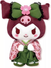 Suppose you miss the beauty of spring and the lovely fragrance of cherry blossoms. Have it forever with the Matcha Sakura Garden Kuromi Kimono Plushie, an enchanting mix of traditional Japanese elegance and kawaii charm. This plushie is made from soft, huggable material, which is perfect for snuggling or adding a cute touch to your space.
Kuromi looks ever so classy in her detailed kimono and lovely green bow making her as sweet as a flower. The vibrant green color and delicate sakura motifs give her a uni